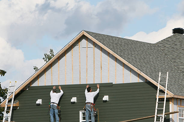 Professional Storm Damage Siding Repair technician working in Palmyra, VA